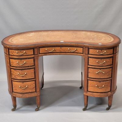 Lot 1473 - A rosewood cross banded satin wood kidney...