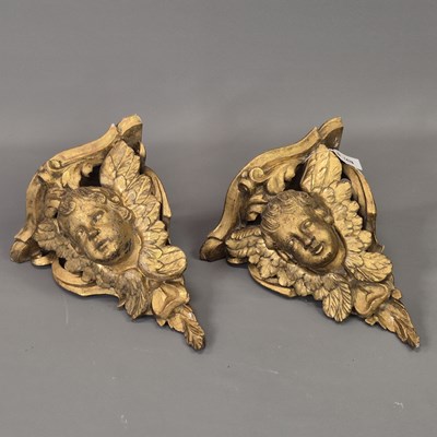 Lot 1476 - A pair of 19th century gilt wood winged angel...