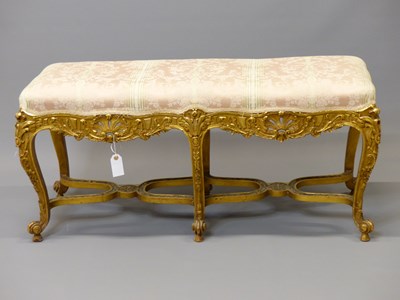 Lot 1477 - An early 20th century gilt wood double stool,...