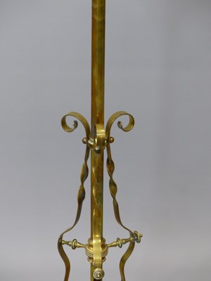 Lot 1479 - A brass floor standing oil lamp converted to...