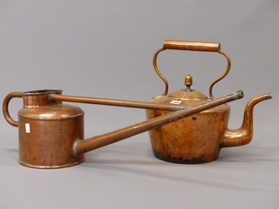 Lot 1485 - A copper long spouted watering can together...