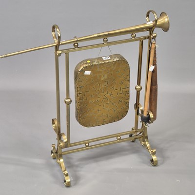 Lot 1488 - A gong on a brass stand, a copper and a brass...