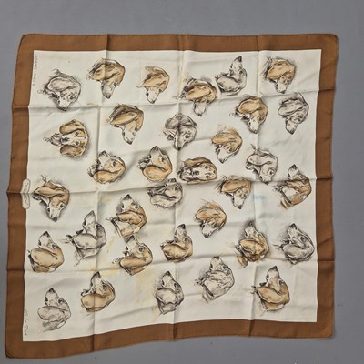 Lot 1505 - An Hermes silk scarf 'Monarch' decorated with...