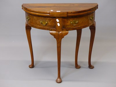 Lot 1523 - A 19th century mahogany flap top demilune...