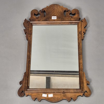 Lot 1531 - A 20th century walnut cutwork framed...