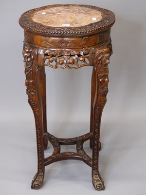 Lot 1546 - A Chinese marble topped hardwood stand, the...