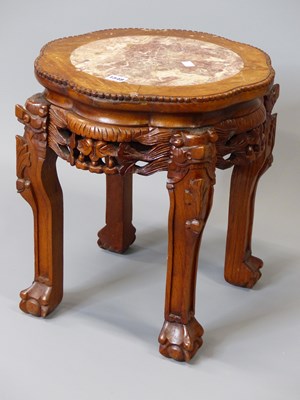 Lot 1548 - A Chinese marble topped hardwood stand, the...