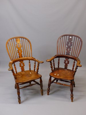 Lot 1551 - Two similar oak and elm tall backed Windsor...