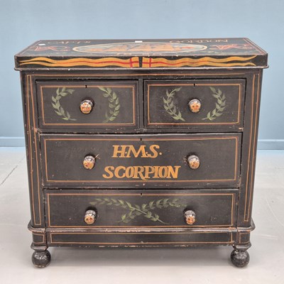 Lot 1556 - A black ground chest of two short and two long...