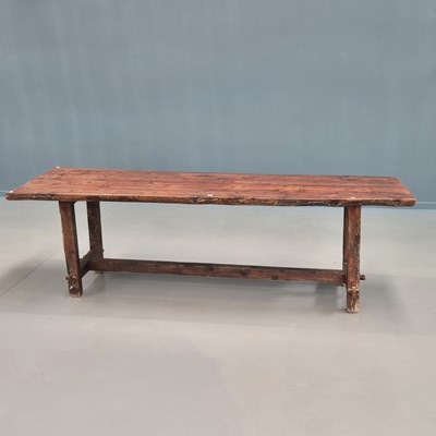 Lot 1557 - A pine refectory table, the four plank top on...