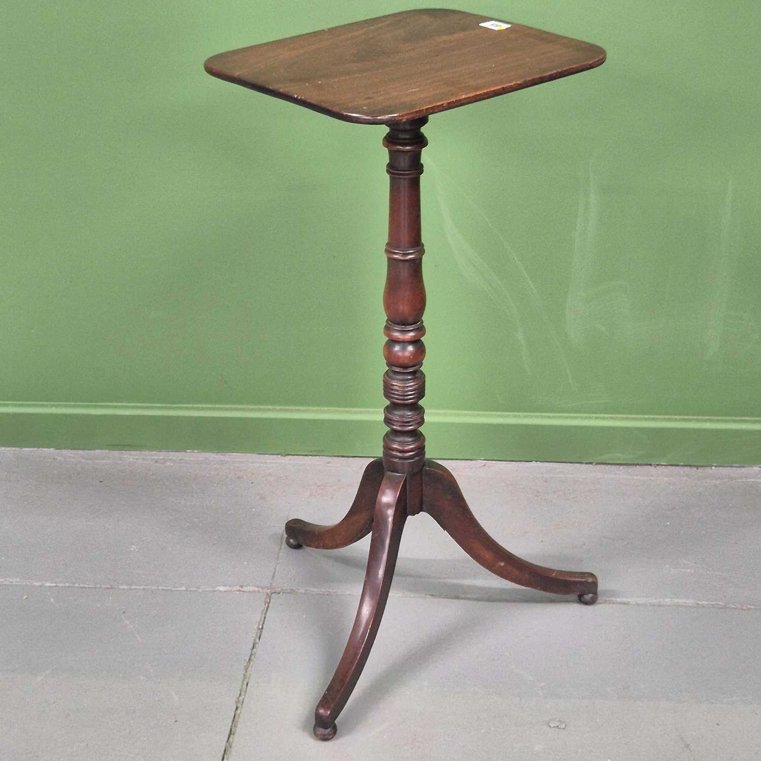 Lot 85 - A regency mahogany candle/lamp table. H 74 W...
