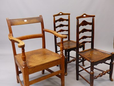 Lot 23 - A 19th century large country made oak armchair,...