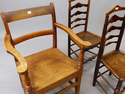 Lot 23 - A 19th century large country made oak armchair,...