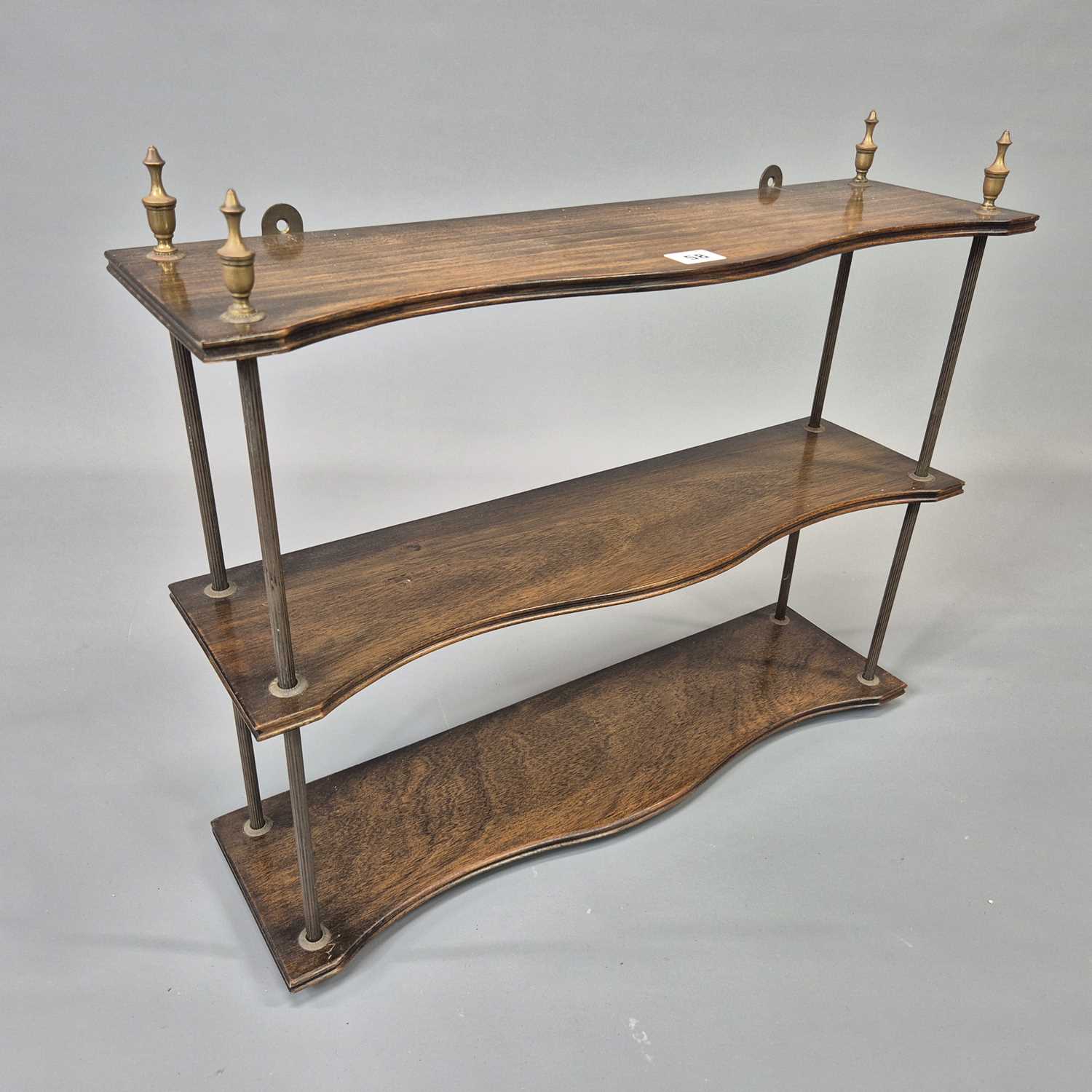 Lot 58 - A vintage mahogany and brass Regency style...