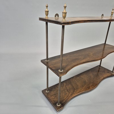 Lot 58 - A vintage mahogany and brass Regency style...