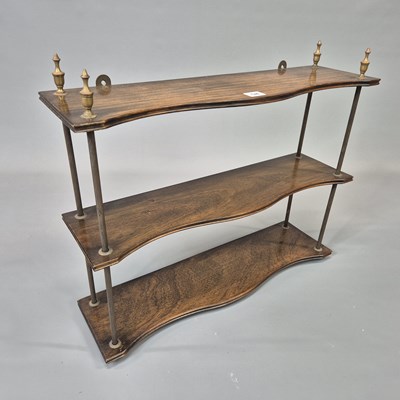 Lot 58 - A vintage mahogany and brass Regency style...