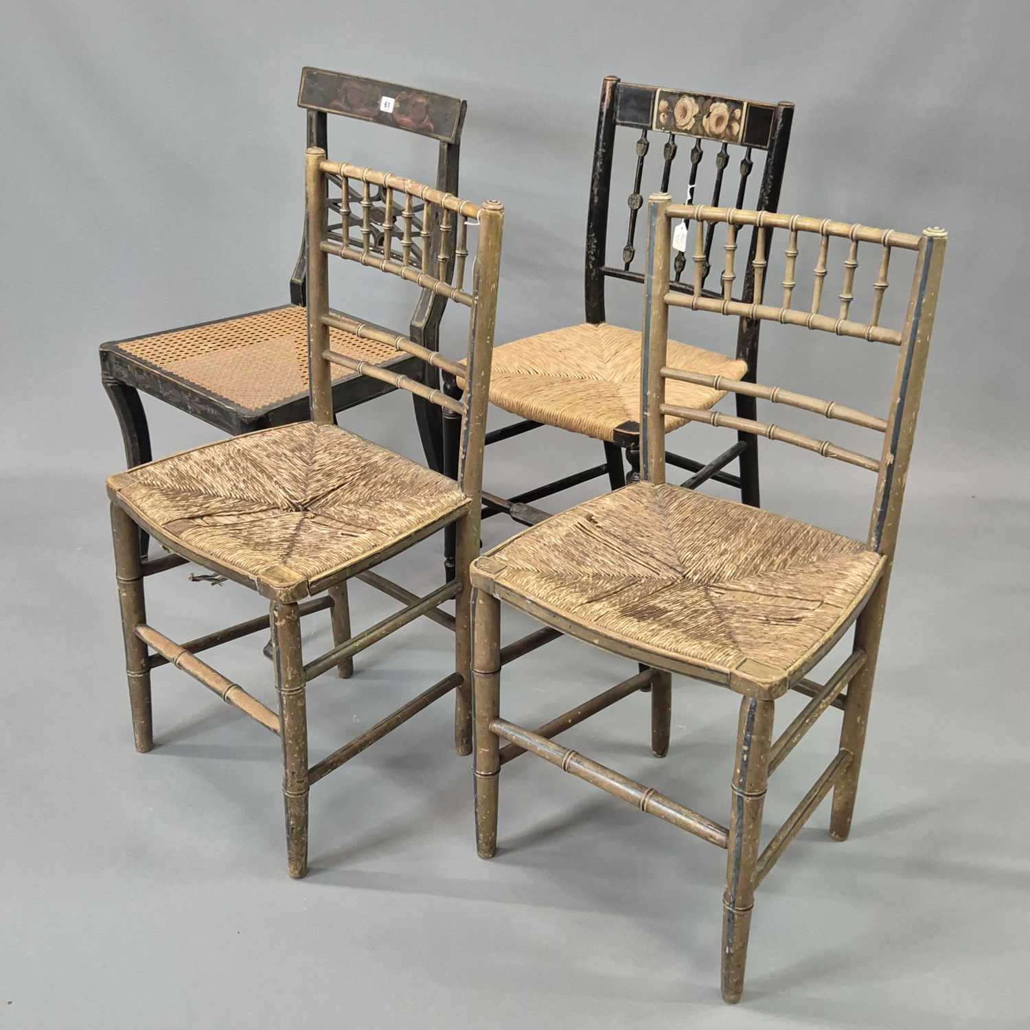 Lot 61 - A group of four Regency chairs retaining...