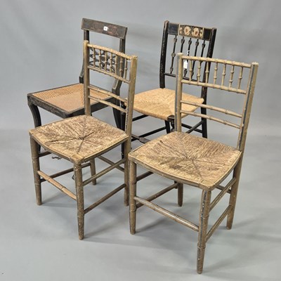 Lot 61 - A group of four Regency chairs retaining...