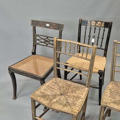 Lot 61 - A group of four Regency chairs retaining...