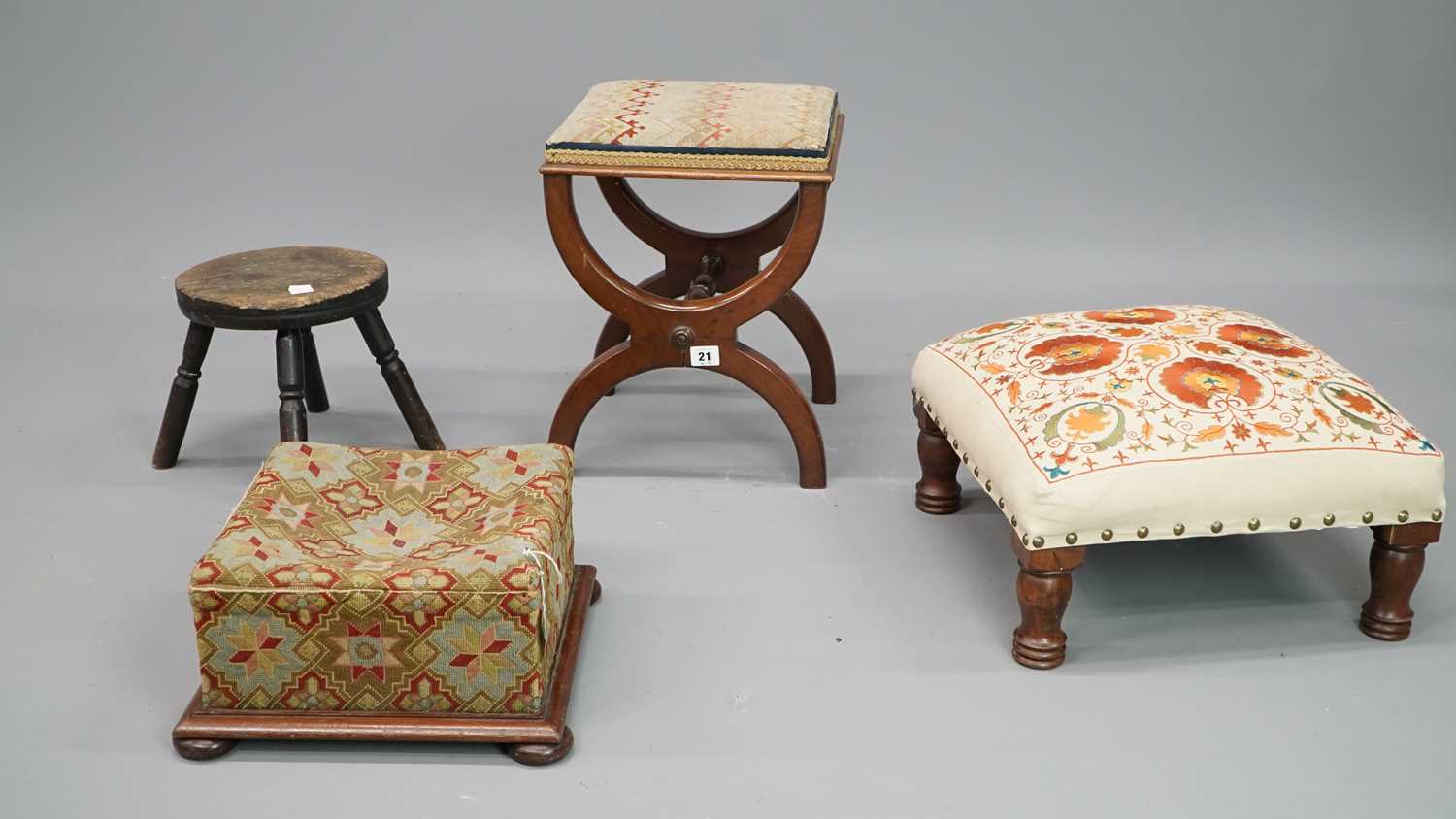 Lot 21 - Four antique and later stools, including a...