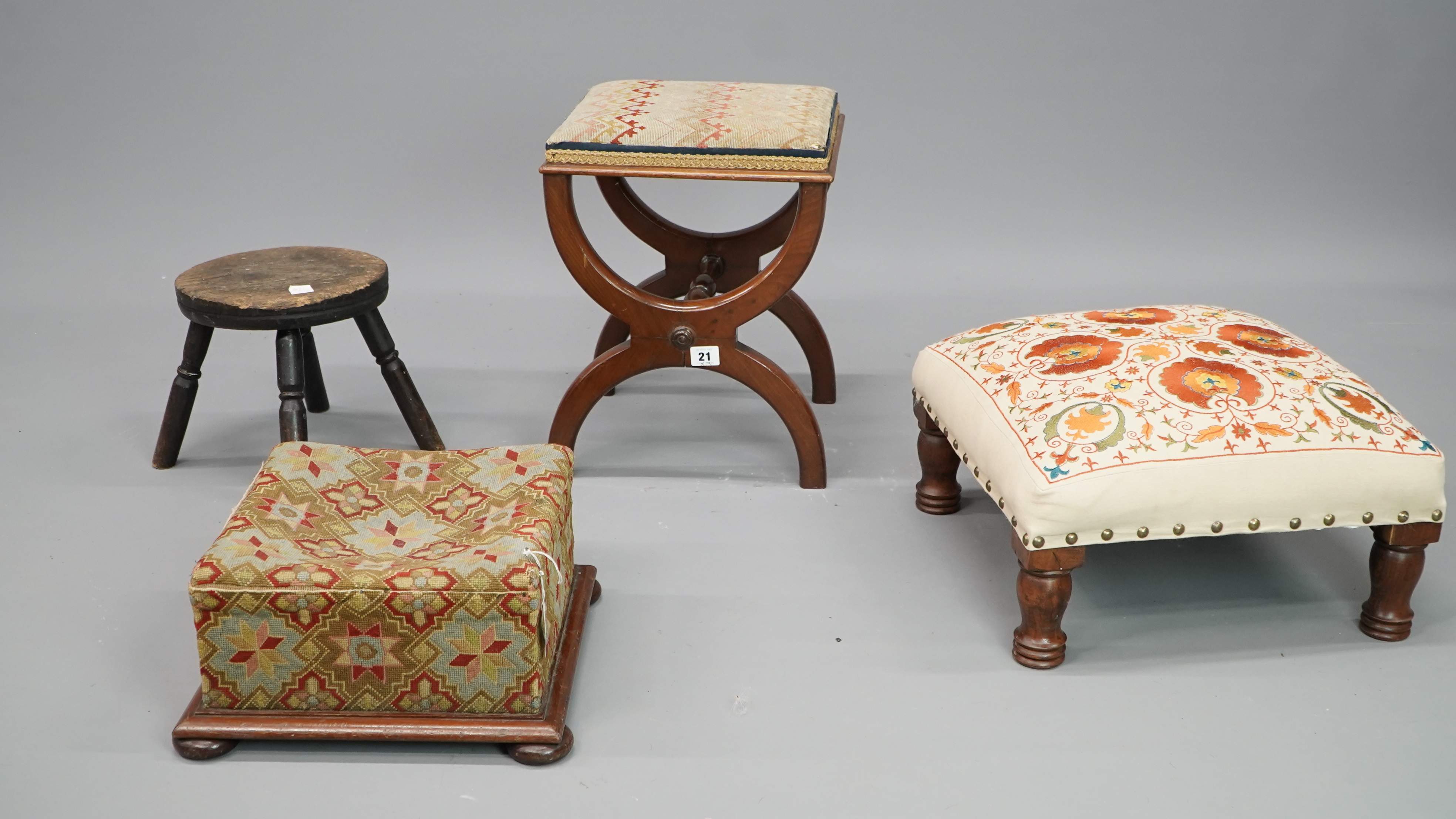 Lot 21 - Four antique and later stools, including a