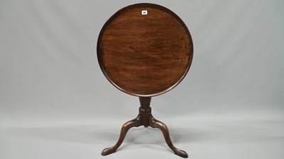 Lot 48 - A Georgian and later carved mahogany tilt top...