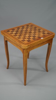 Lot 229 - An antique walnut inlaid French provincial...