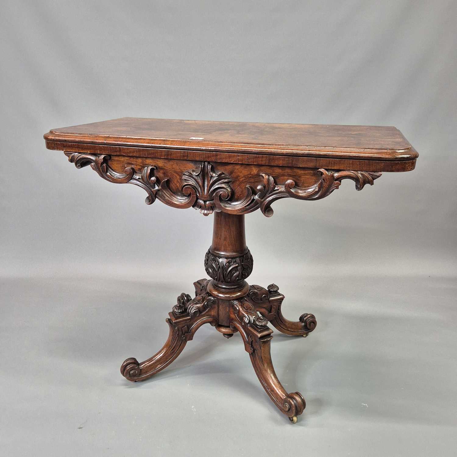 Lot 60 - A Victorian carved burl walnut games table,...