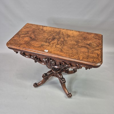 Lot 60 - A Victorian carved burl walnut games table,...