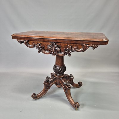 Lot 60 - A Victorian carved burl walnut games table,...