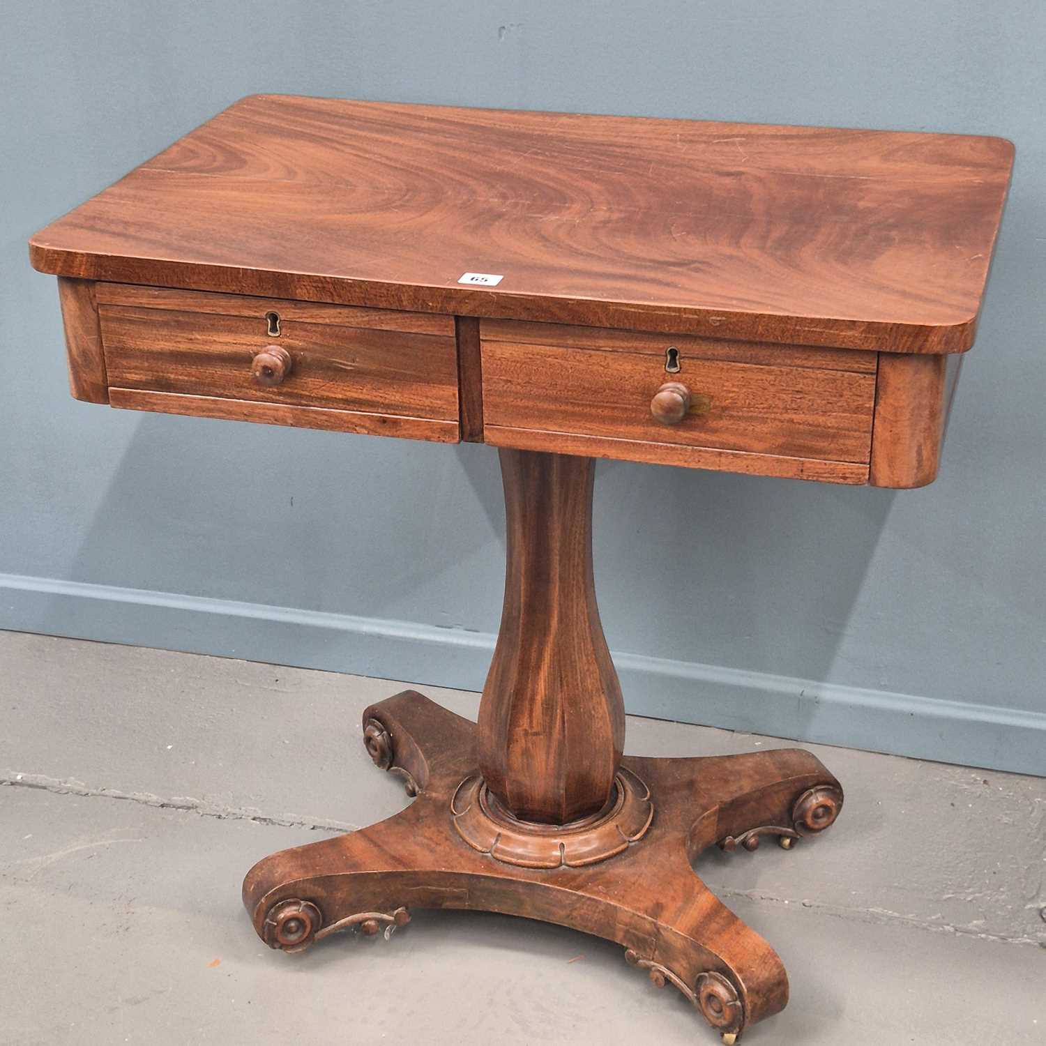 Lot 65 - An early Victorian carved mahogany two drawer...