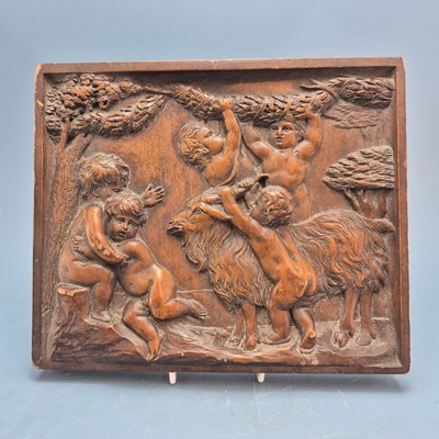 Lot 193 - An antique walnut well carved panel depicting...