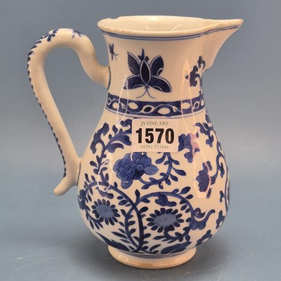 Lot 1570 - A Chinese blue and baluster jug painted with...