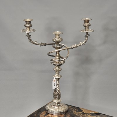 Lot 770 - A plate on copper three light candelabrum, the...