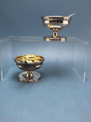 Lot 773 - A pair of silver footed salt bowls by William...