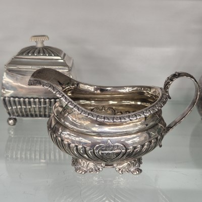 Lot 781 - A George III silver cream jug together with a...