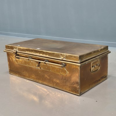 Lot 1602 - A brass two handled cabin trunk.   W 93 x D 49...