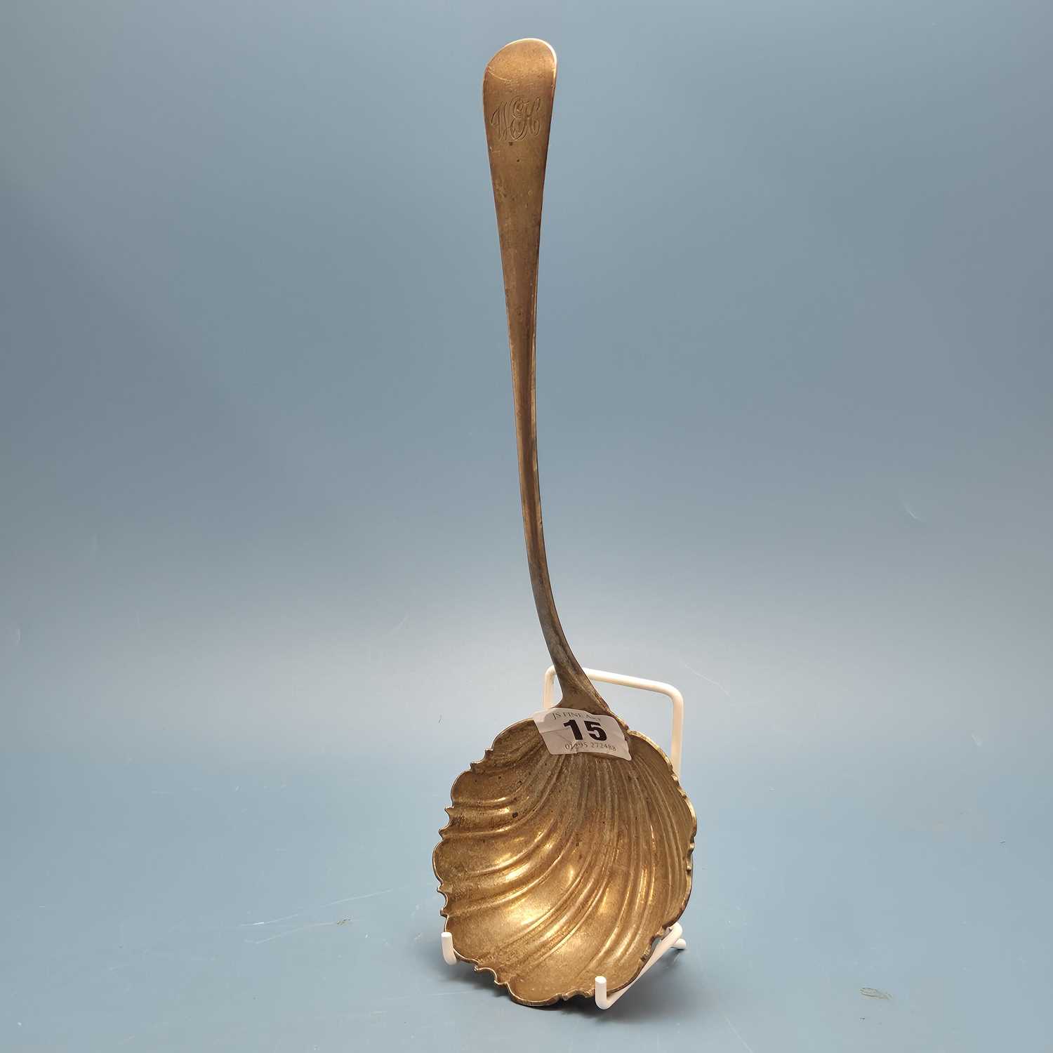 Lot 15 - A hallmarked silver Georgian style punch ladle...