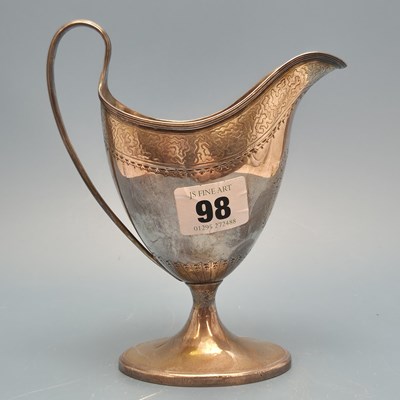 Lot 98 - Georgian silver cream jug of classic helmet...