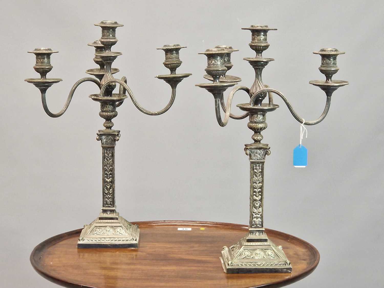 Lot 73 - A pair of late Victorian silver plate four...