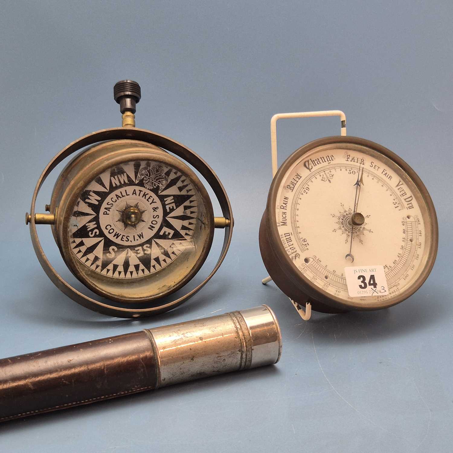 Lot 34 - A group of three marine vintage items includes...