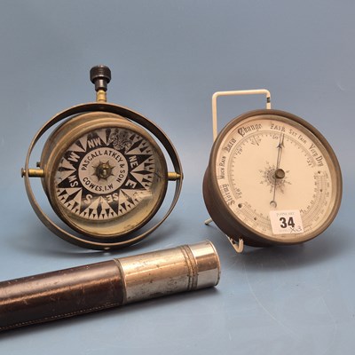 Lot 34 - A group of three marine vintage items includes...