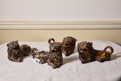 Lot 163 - Two pairs of antique treacle glaze pottery...
