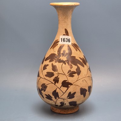 Lot 1636 - A Chinese cizhou type bottle vase, the body...