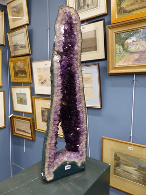 Lot 1639 - An amethyst geode.   W 67cms