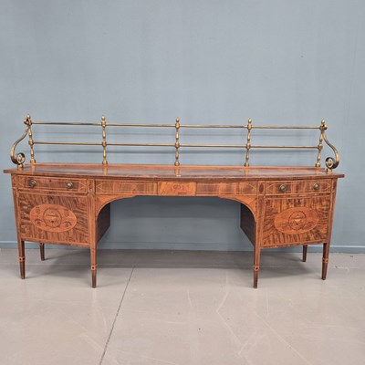 Lot 1647 - A 19th century cross banded mahogany bow front...