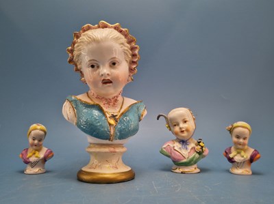Lot 810 - Four various Dresden porcelain busts of...