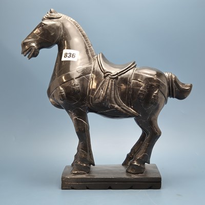 Lot 836 - A Chinese black stone carving of a saddled...