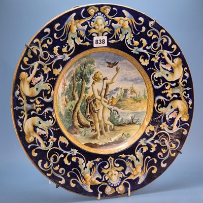 Lot 838 - A 19th century Italian majolica dish painted...