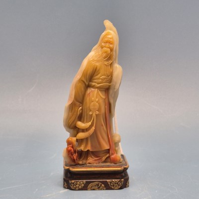 Lot 1671 - A Chinese toffee brown soapstone carving of...